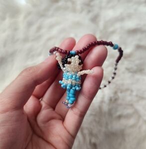 Handmade black brown and green beaded princess jasmine charm ( I made it myself)